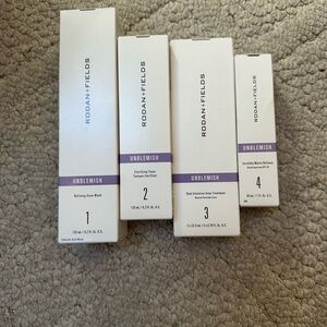 Rodan + Fields Unblemish Skincare Set - White and Purple